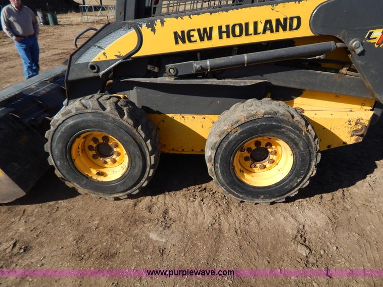 image for item G9351 New Holland L180 skid steer
