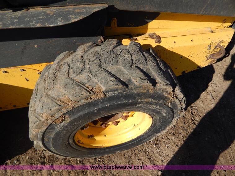 image for item G9351 New Holland L180 skid steer