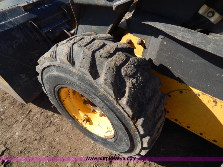 image for item G9351 New Holland L180 skid steer