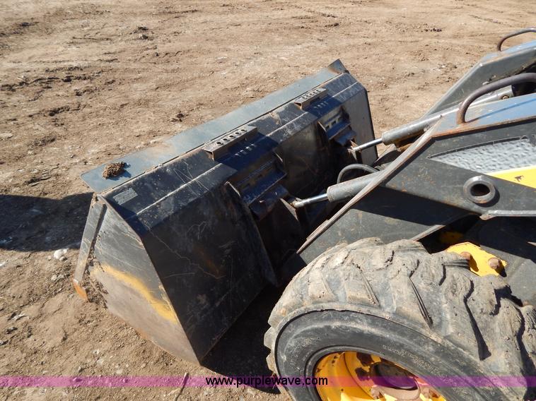 image for item G9351 New Holland L180 skid steer