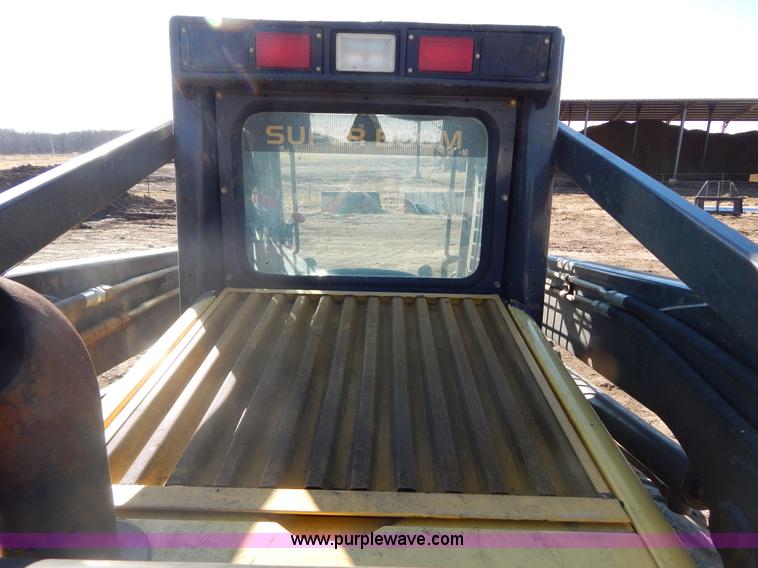 image for item G9351 New Holland L180 skid steer