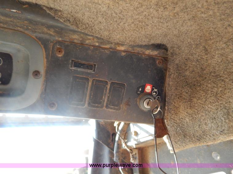 image for item G9351 New Holland L180 skid steer