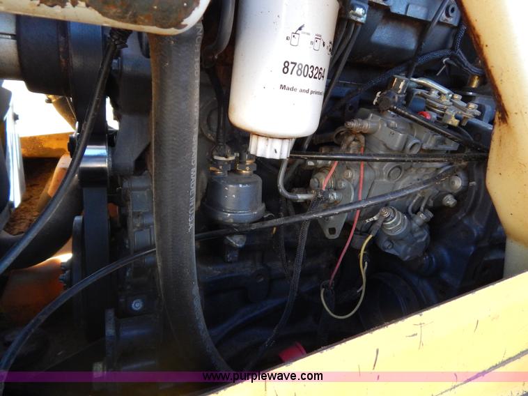 image for item G9351 New Holland L180 skid steer