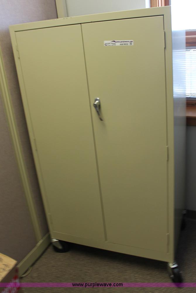 image for item AM9932 Locking metal cabinet