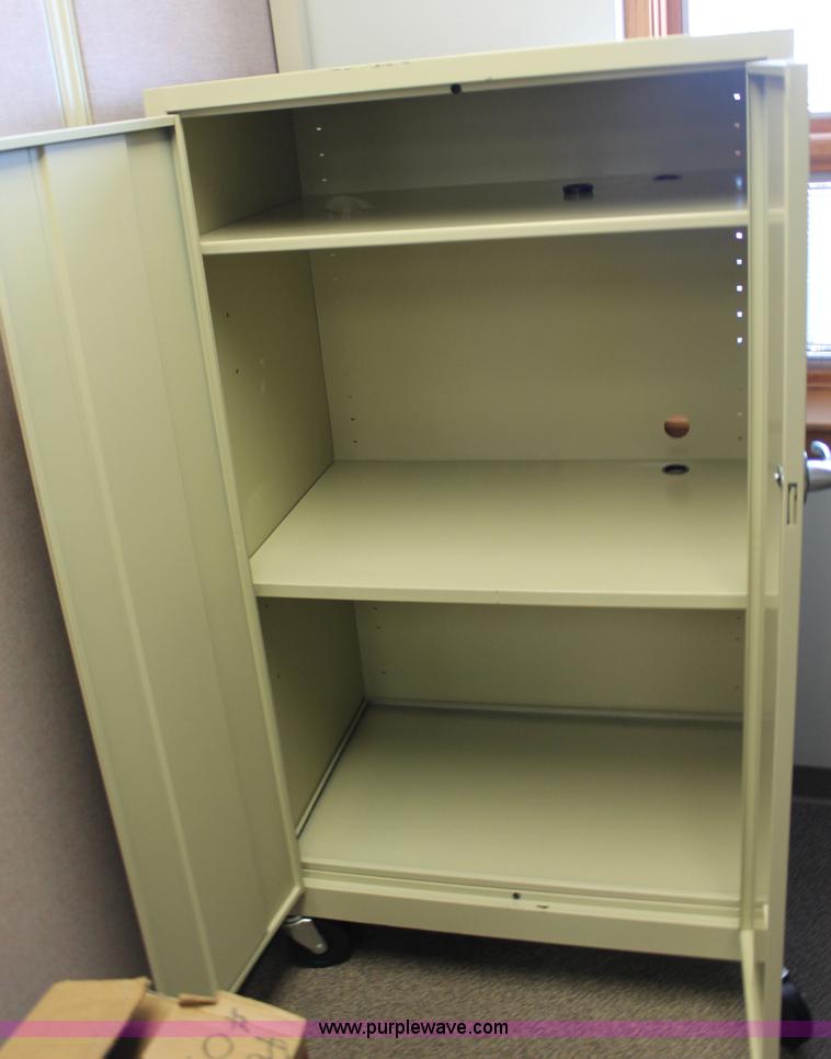 image for item AM9932 Locking metal cabinet