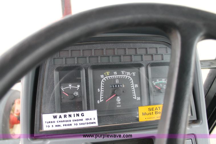 image for item G8207 2000 New Holland TS100 tractor