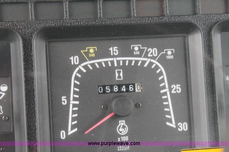 image for item G8207 2000 New Holland TS100 tractor