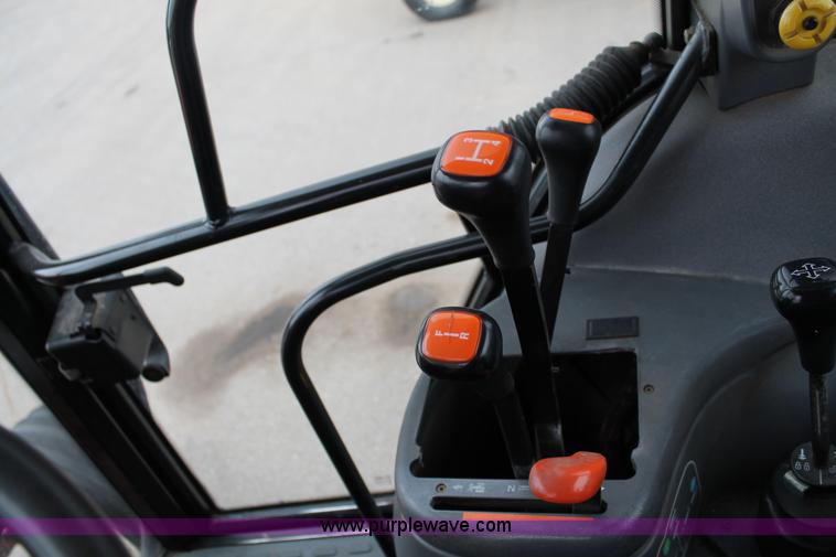 image for item G8207 2000 New Holland TS100 tractor