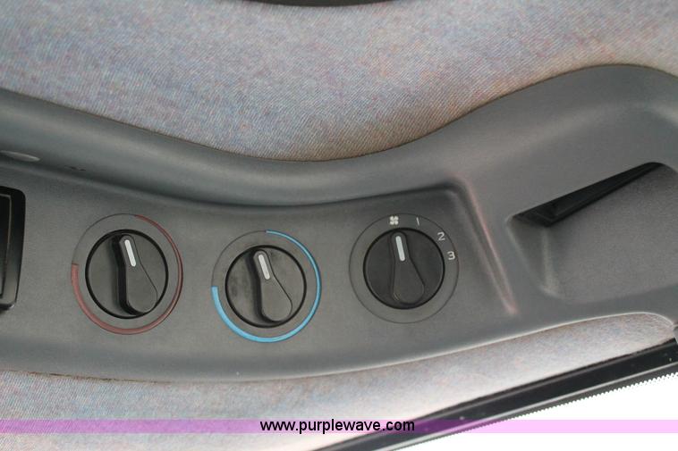 image for item G8207 2000 New Holland TS100 tractor