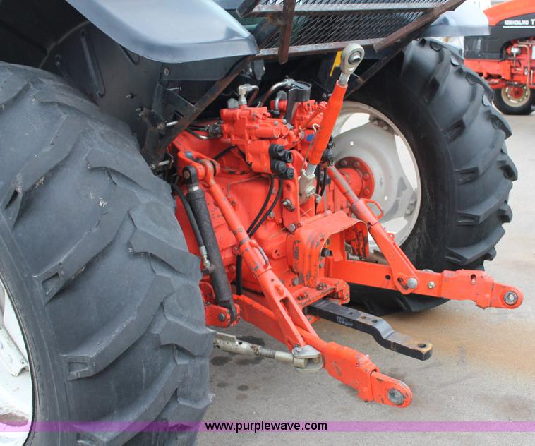 image for item G8207 2000 New Holland TS100 tractor