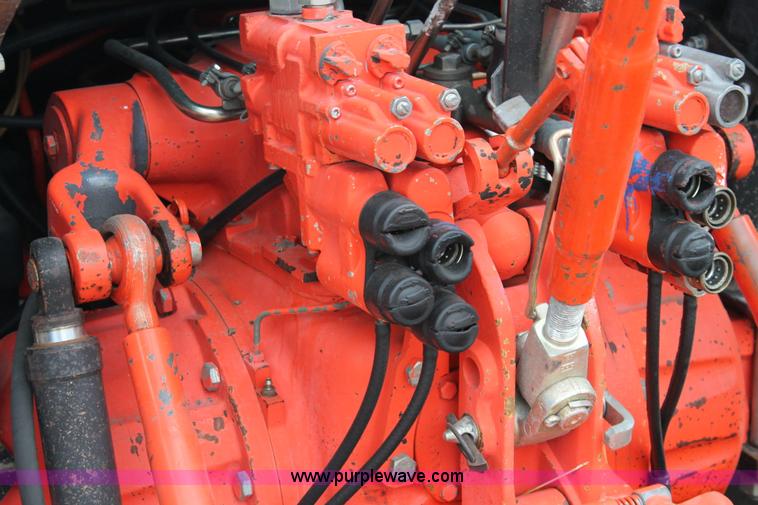 image for item G8207 2000 New Holland TS100 tractor