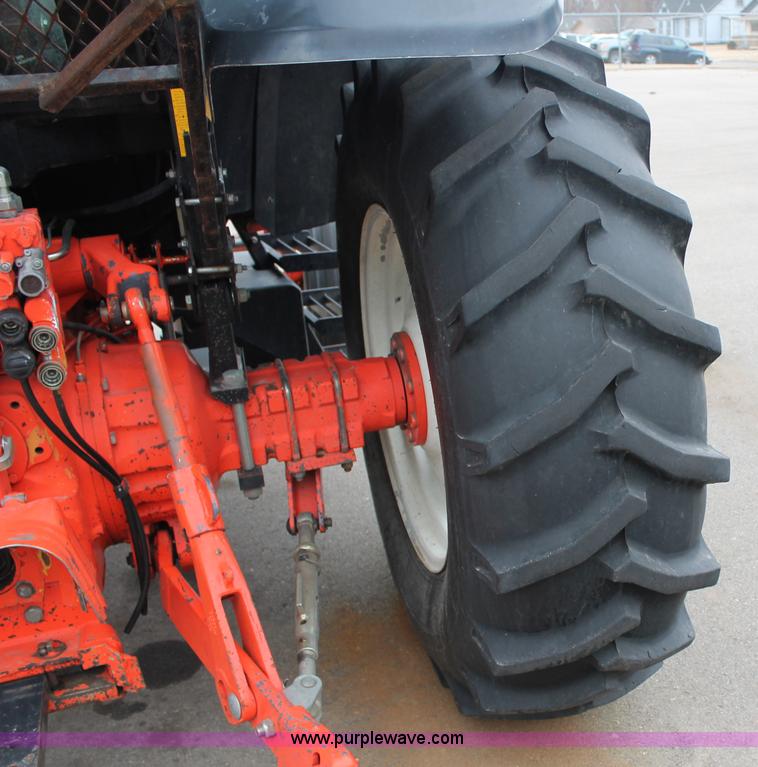 image for item G8207 2000 New Holland TS100 tractor