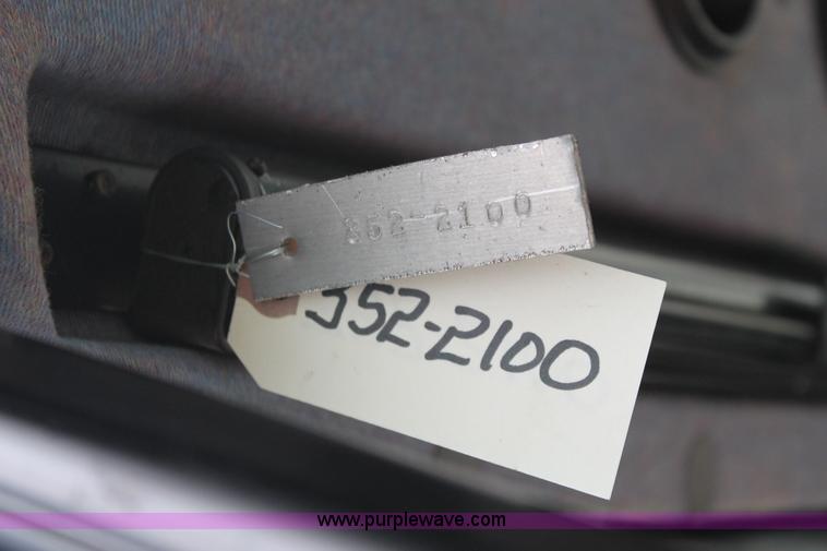 image for item G8207 2000 New Holland TS100 tractor