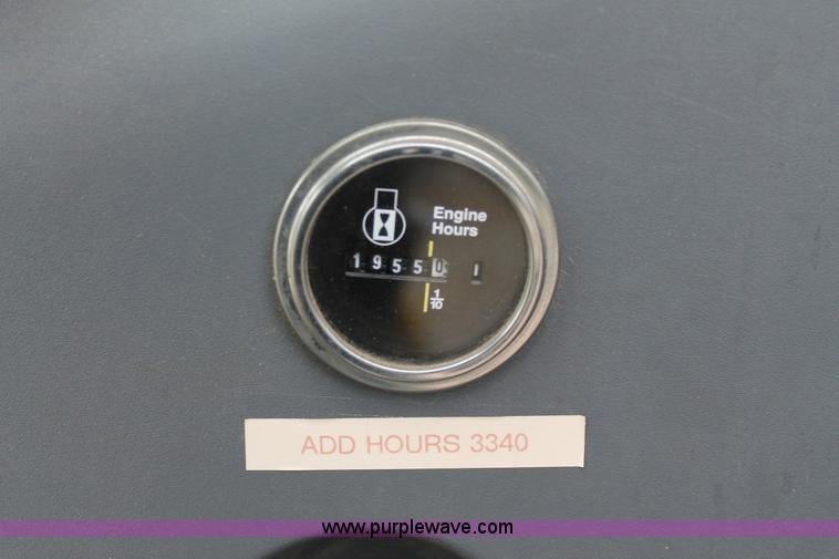 image for item G8208 2000 New Holland TS100 tractor