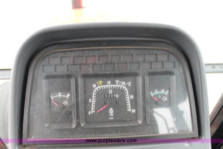 image for item G8208 2000 New Holland TS100 tractor