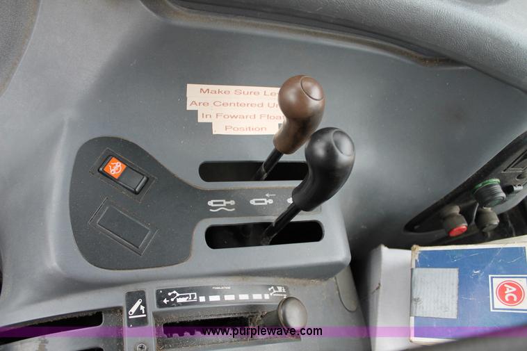 image for item G8208 2000 New Holland TS100 tractor