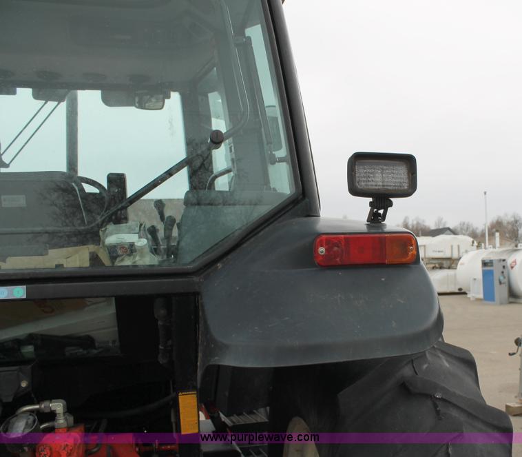 image for item G8208 2000 New Holland TS100 tractor