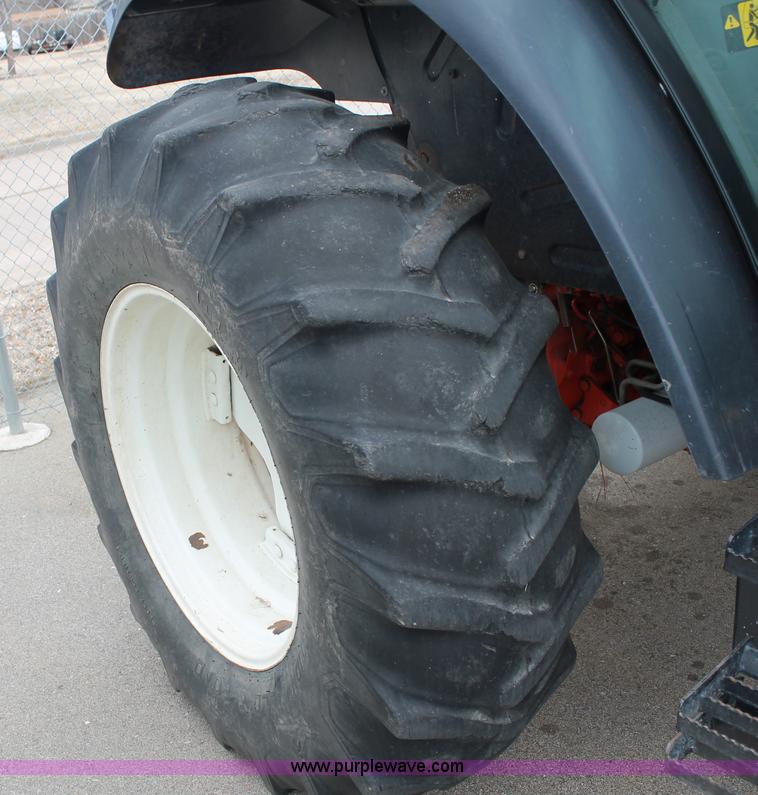 image for item G8208 2000 New Holland TS100 tractor