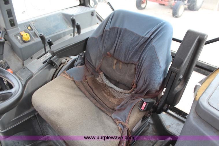 image for item H1489 1998 New Holland 6640SL tractor