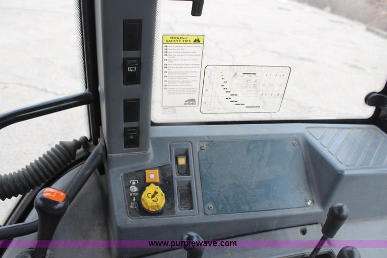 image for item H1489 1998 New Holland 6640SL tractor