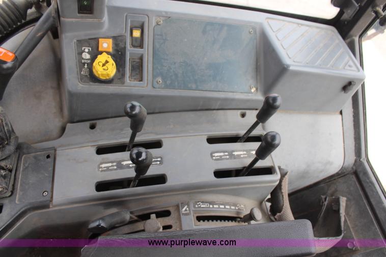 image for item H1489 1998 New Holland 6640SL tractor