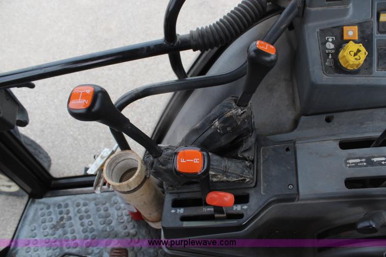 image for item H1489 1998 New Holland 6640SL tractor