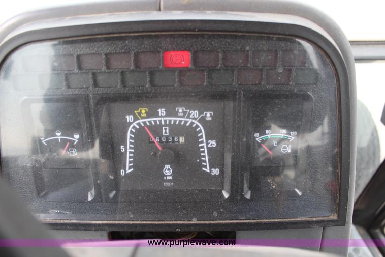 image for item H1489 1998 New Holland 6640SL tractor