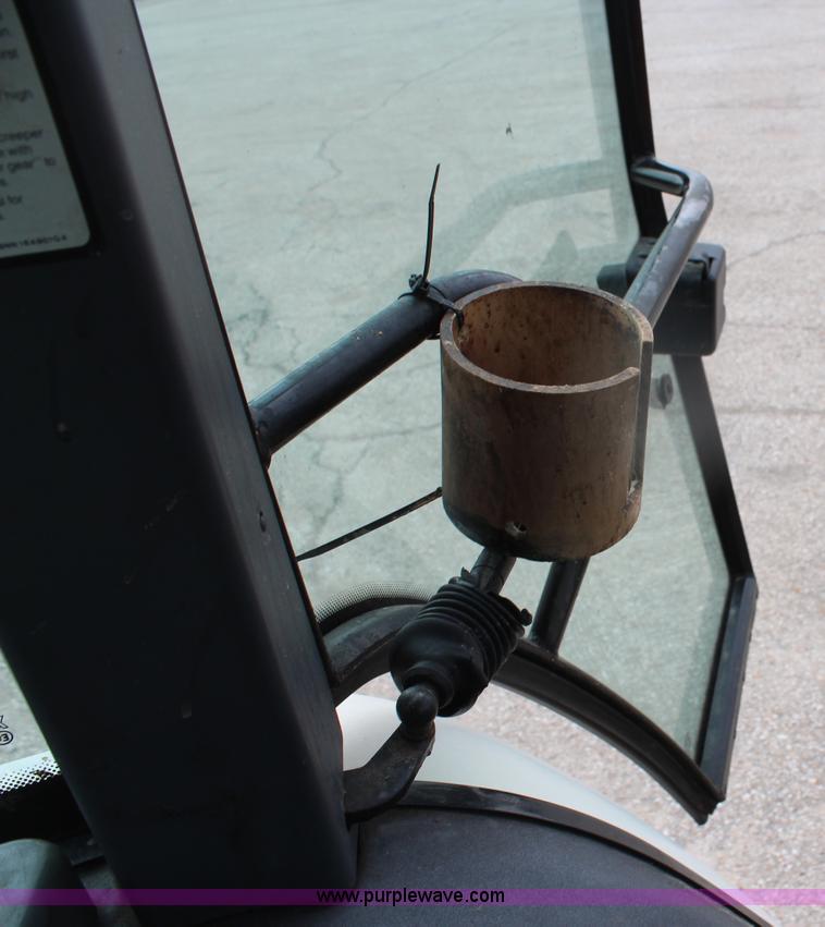 image for item H1489 1998 New Holland 6640SL tractor