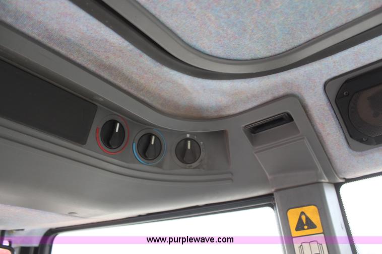 image for item H1489 1998 New Holland 6640SL tractor