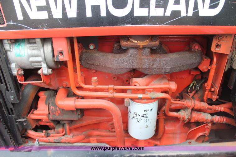 image for item H1489 1998 New Holland 6640SL tractor