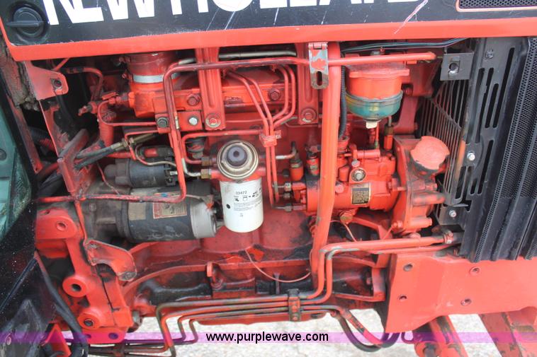 image for item H1489 1998 New Holland 6640SL tractor