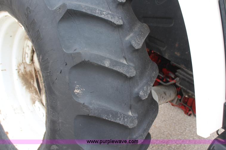 image for item H1489 1998 New Holland 6640SL tractor