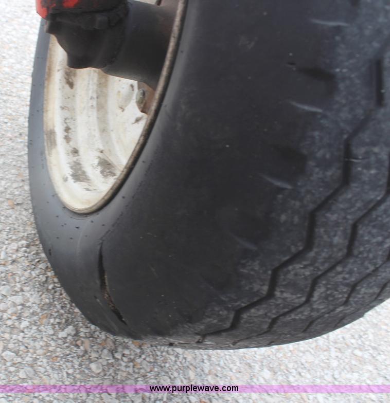 image for item H1489 1998 New Holland 6640SL tractor