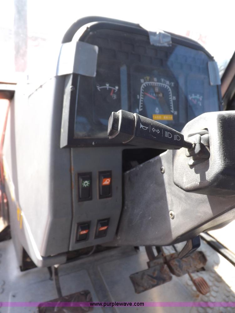 image for item I9100 1997 New Holland 7740SL MFWD tractor