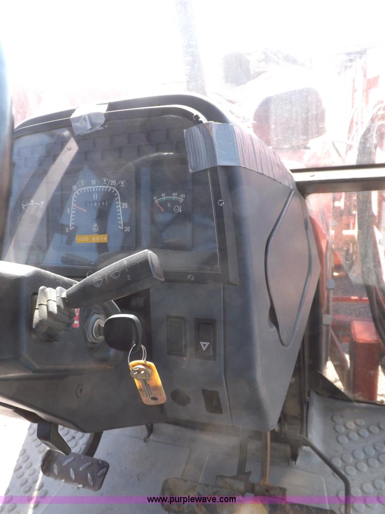 image for item I9100 1997 New Holland 7740SL MFWD tractor