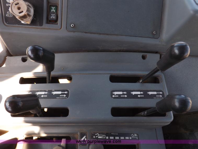 image for item I9100 1997 New Holland 7740SL MFWD tractor