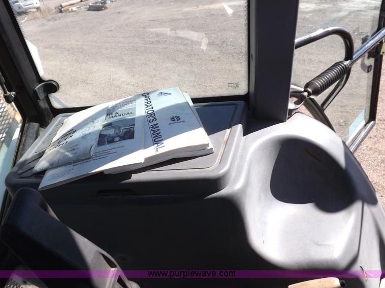 image for item I9100 1997 New Holland 7740SL MFWD tractor