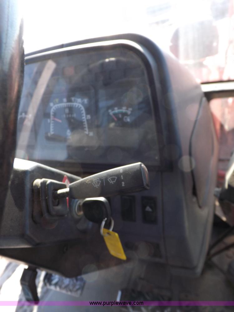 image for item I9101 1997 New Holland 7740SL MFWD tractor