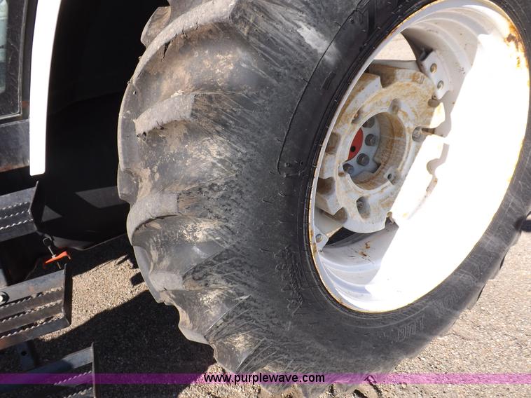 image for item I9101 1997 New Holland 7740SL MFWD tractor