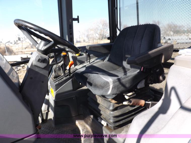 image for item I9102 1997 New Holland 7740SL MFWD tractor