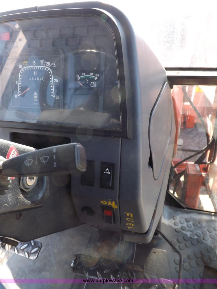 image for item I9102 1997 New Holland 7740SL MFWD tractor