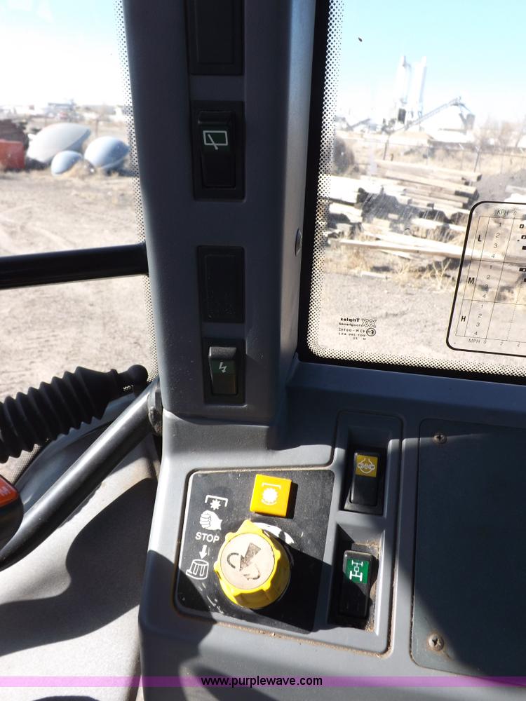 image for item I9102 1997 New Holland 7740SL MFWD tractor