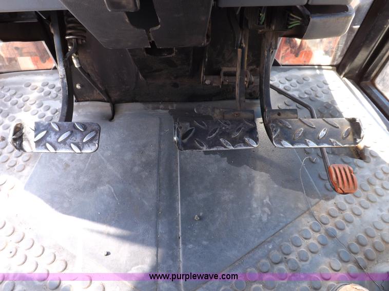 image for item I9102 1997 New Holland 7740SL MFWD tractor