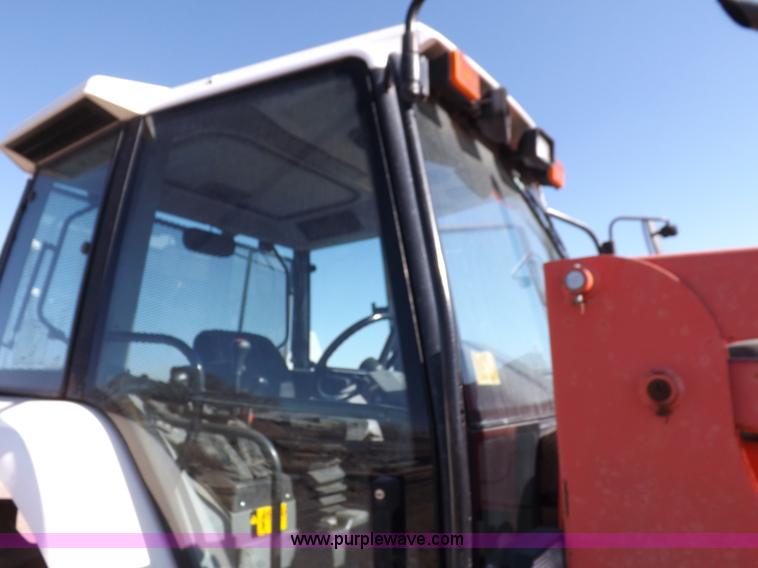 image for item I9102 1997 New Holland 7740SL MFWD tractor