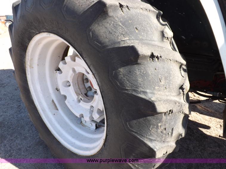 image for item I9102 1997 New Holland 7740SL MFWD tractor