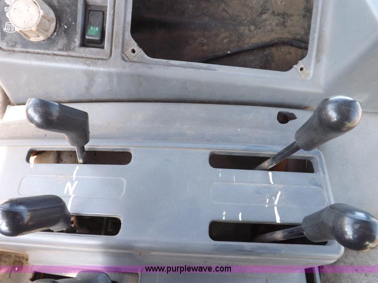 image for item I9103 1996 New Holland 7740SL MFWD tractor