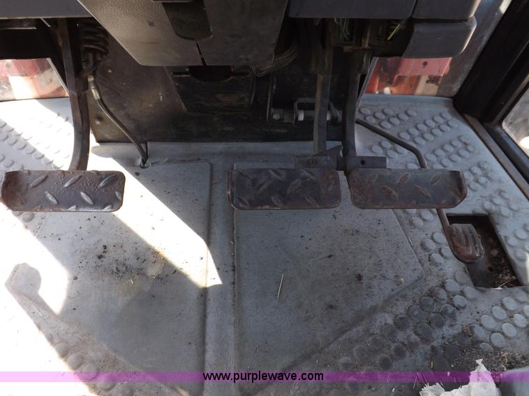 image for item I9103 1996 New Holland 7740SL MFWD tractor