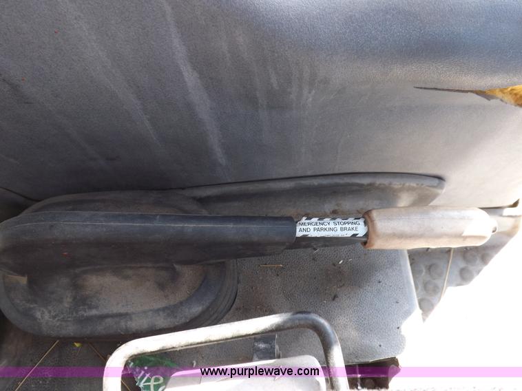 image for item I9103 1996 New Holland 7740SL MFWD tractor