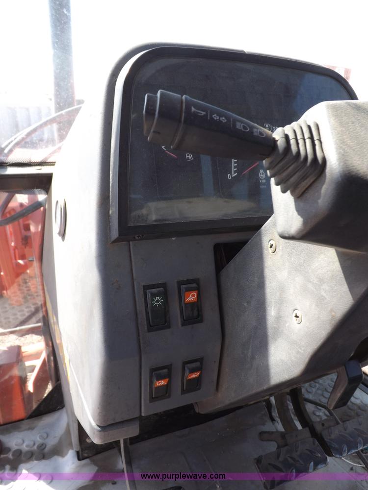 image for item I9104 1997 New Holland 7740SL MFWD tractor