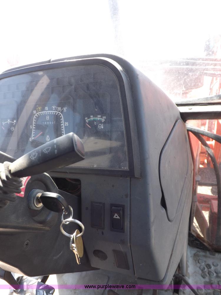 image for item I9104 1997 New Holland 7740SL MFWD tractor